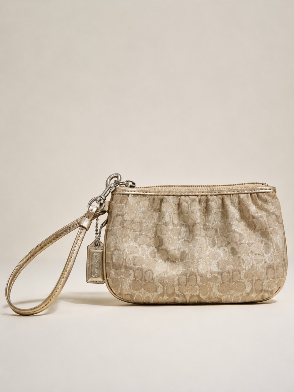 NWOT Coach Metallic Signature Wristlet